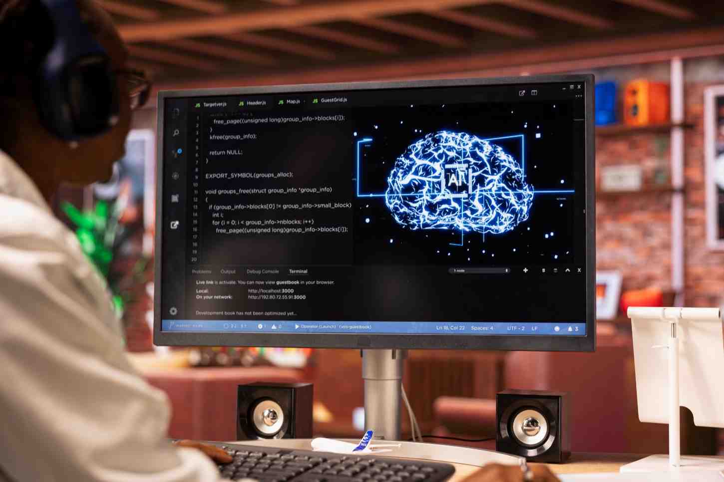remote-employee-works-with-ai-deep-learning-neural-networks-desktop-pc (1) NumPy and Pandas Course Hyderabad